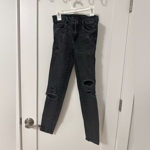 Black fitted jeans , looks great with any top!